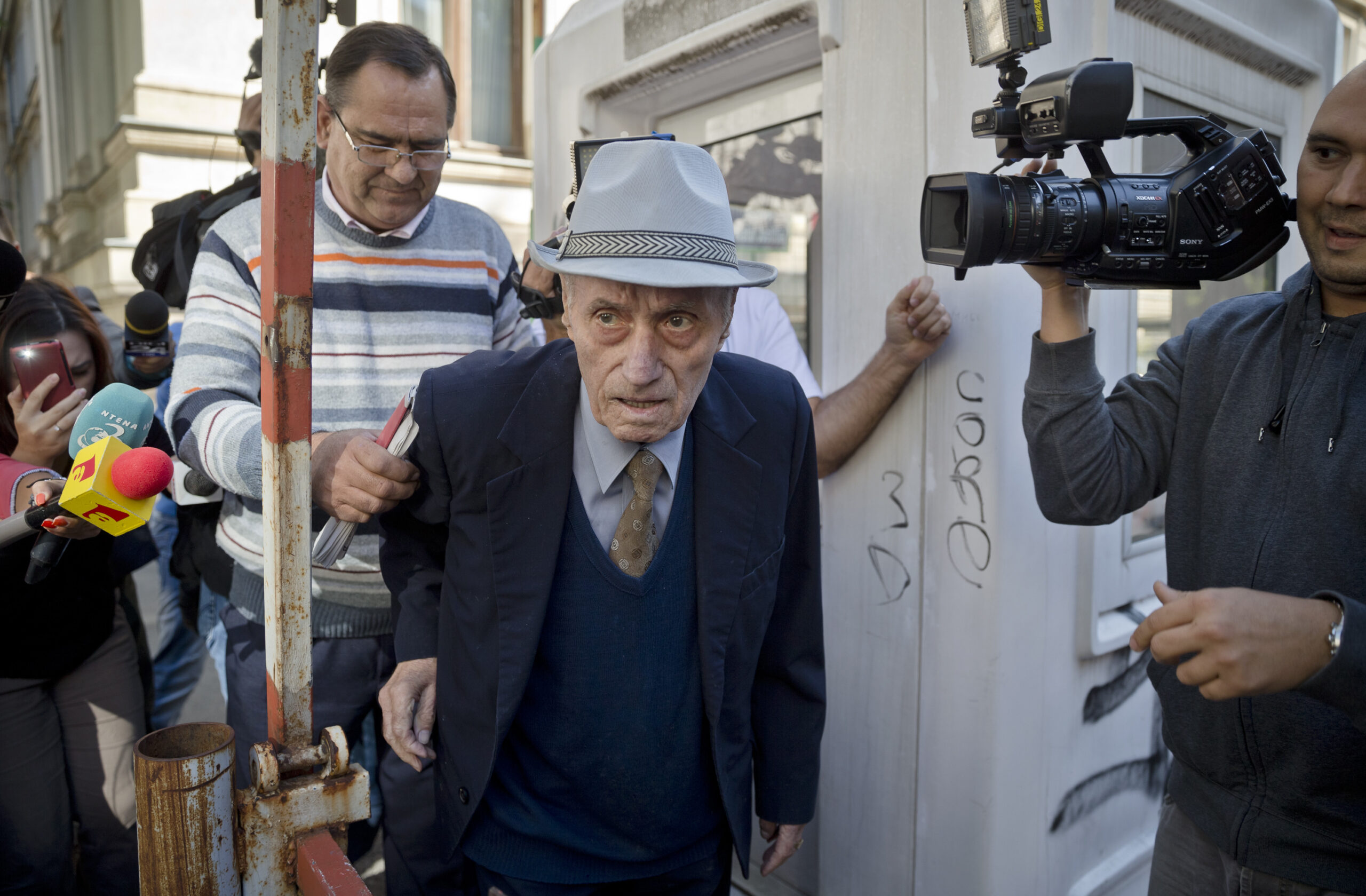 Romania puts ex-communist prison chief on trial