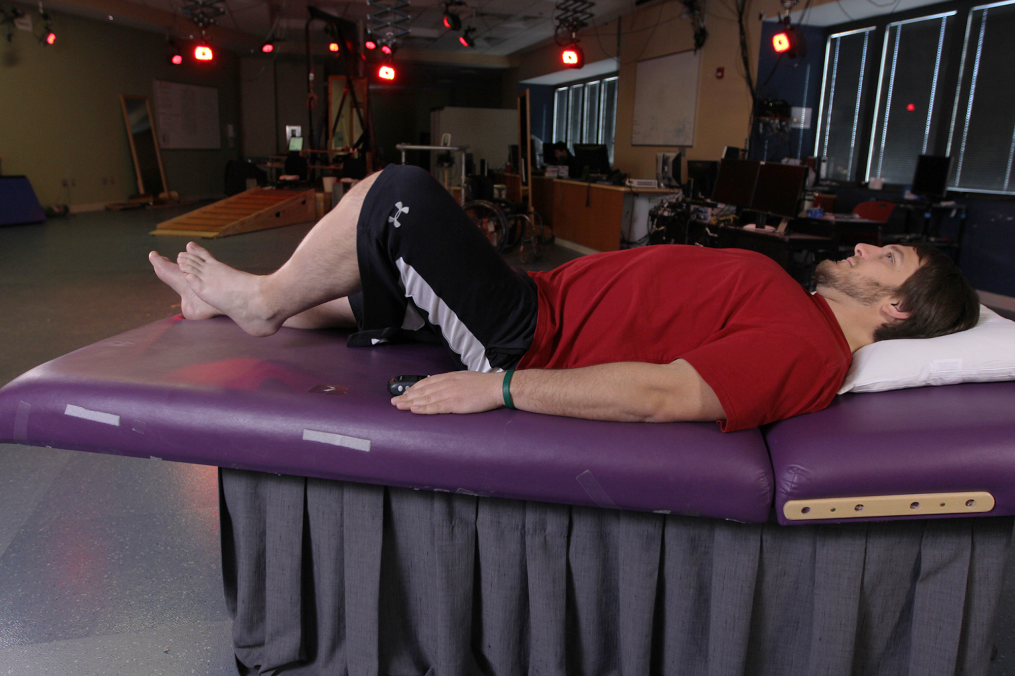 Electrical device helps paralyzed men move legs