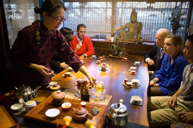 Vice President Joe Biden, granddaughter Finnegan Biden, Dylan Locke, U.S. Ambassador Gary Locke, Mona Locke, and Hunter Biden sample tea during a traditional tea tasting ceremony, at Liu Xian Guan Teahouse in the Dongcheng District of Beijing, China, December 5, 2013. (Official White House Photo by David Lienemann)
