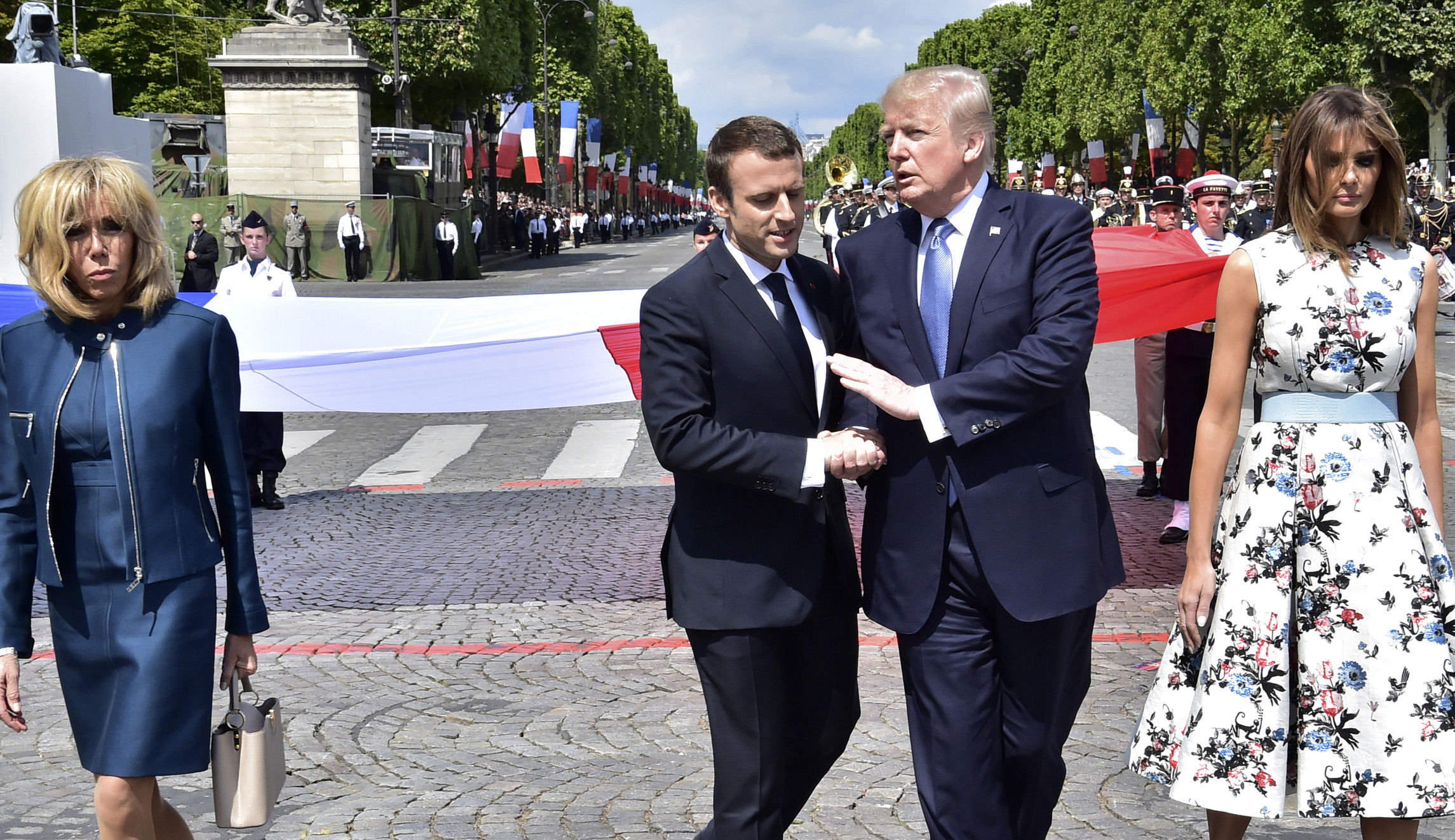 Emmanuel Macron jokes about his handsy relationship with Trump
