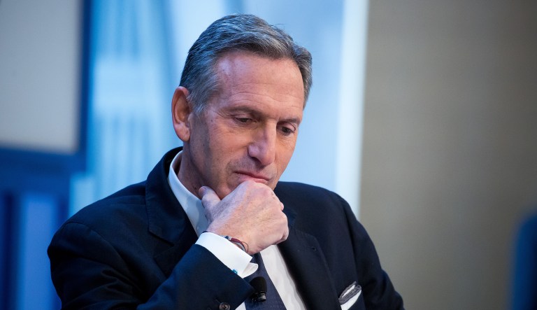 Howard Schultz, chairman and CEO of Starbucks, listens during the New York Times DealBook conference in New York on Thursday, Nov. 10, 2016.