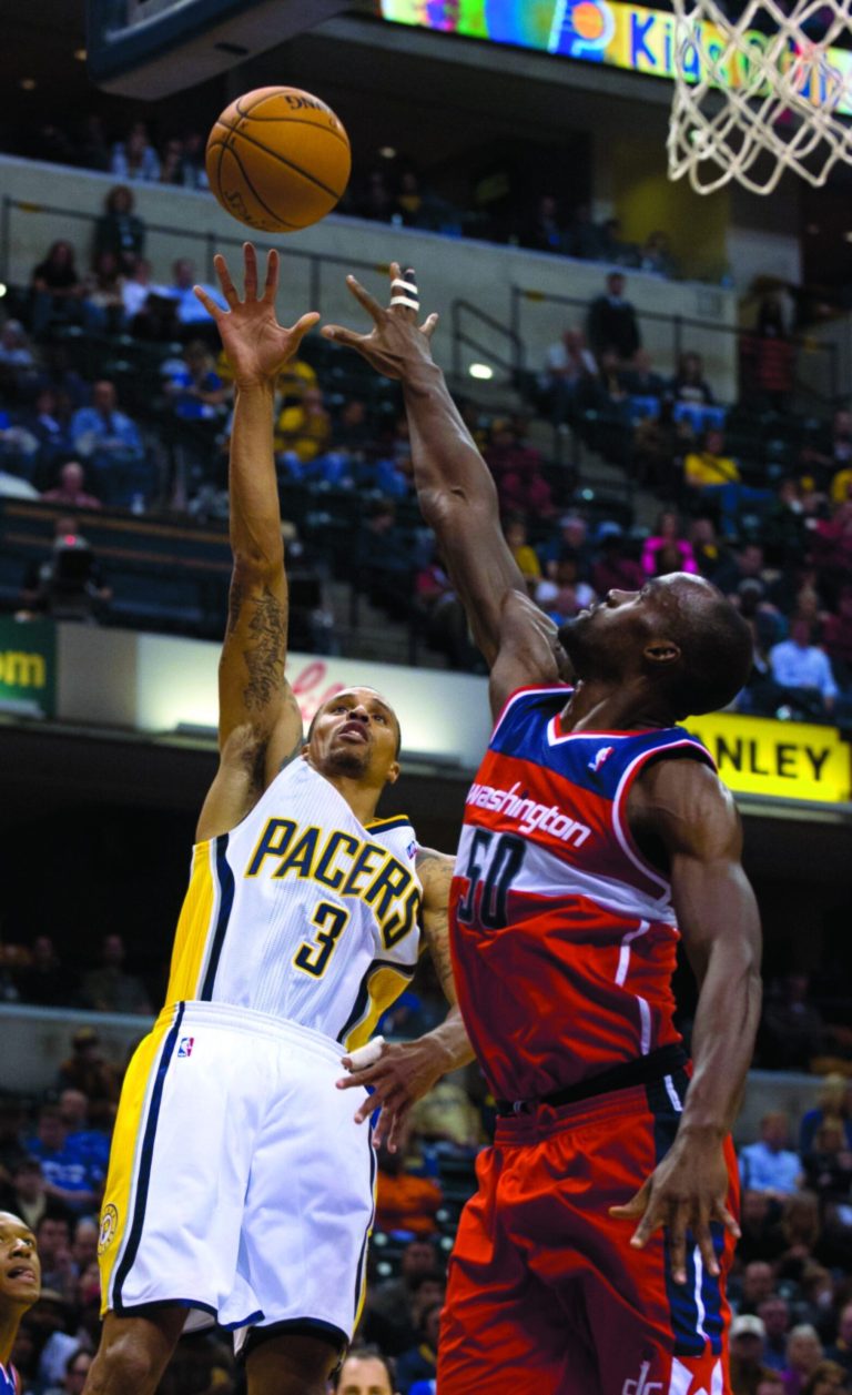 Doug McSchooler/AP
Emeka Okafor finished with 17 points and eight rebounds in the Wizards' fifth consecutive loss to start the season.