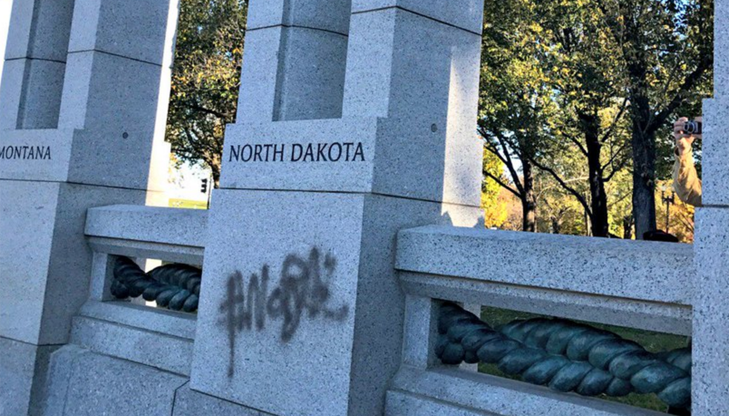 Anti-pipeline slogan spraypainted on WWII Memorial