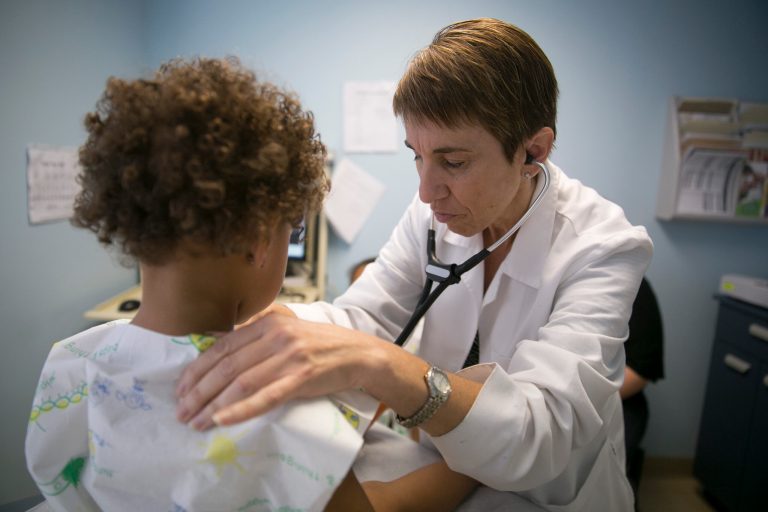 Certified nurse practitioner conducts a check-up on a patient at a Community Clinic Inc. health center in Takoma Park, Maryland. (Andrew Harrer/Bloomberg)