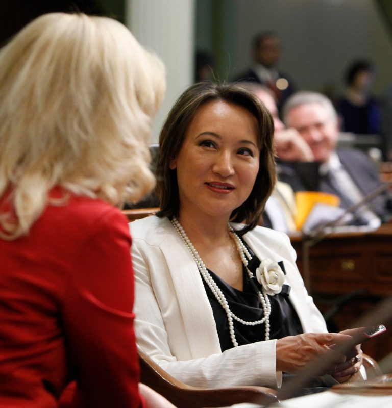 FILE - In this Jan. 4, 2012 file photo, former Assemblywoman Mary Hayashi, D-Hayward, right, talks with then Assemblywoman Cathleen Galgiani, D-Ceres, at the Capitol in Sacramento, Calif. Hayashi, who pleaded no contest to shoplifting while in her last term in the Assembly in 2012,  is in a heated battle against Assemblyman Bob Wieckowski, D-Fremont, for the Senate District 10 seat.(AP Photo/Rich Pedroncelli, File)