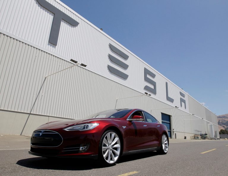Federal regulators announced Tuesday that they will investigate what caused three Tesla Model S plug-in electric vehicles to catch fire in six weeks. (AP Photo)