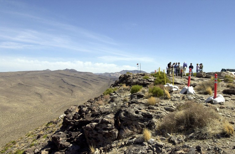A media group tours the peak of the proposed Yucca Mountain nuclear waste dump near Mercury, Nev. (AP/Joe Cavaretta)