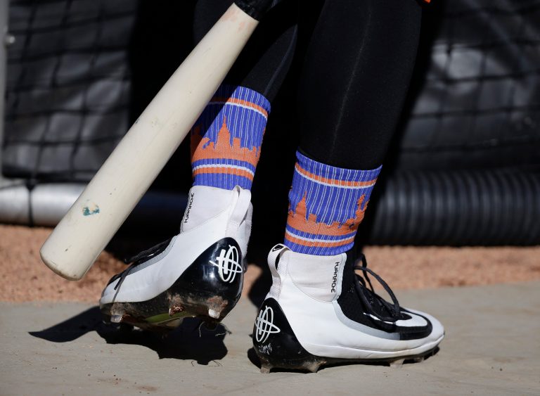 New York Mets' Michael Conforto's team socks are visible above his leggings while waiting for batting practice during a team workout.Â New York Gov. Andrew Cuomo and Missouri Gov. Jay Nixon are making a wager onÂ their respective baseball teams to win the World Series.Â (AP Photo/Julie Jacobson)