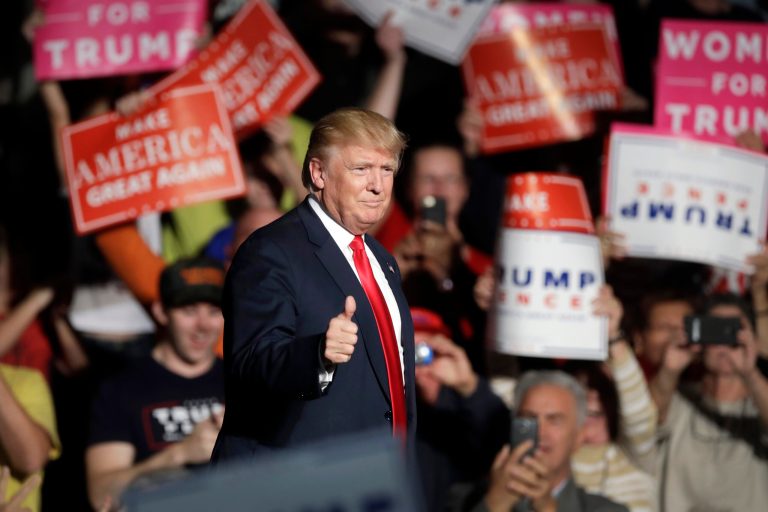 Trump and Pence have seized on news that healthcare premiums are set to rise an average of 25 percent. (AP Photo/Carlos Osorio)