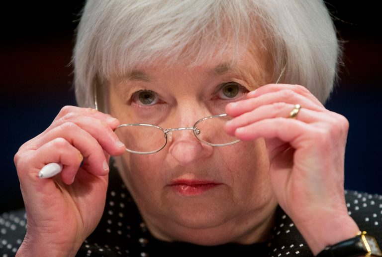 Federal Reserve Chair Janet Yellen removes her glasses as she testifies on Capitol Hill in Washington, Wednesday, Feb. 25, 2015, before the House Financial Services Committee hearing: Monetary Policy and the State of the Economy. (AP Photo/Pablo Martinez Monsivais)