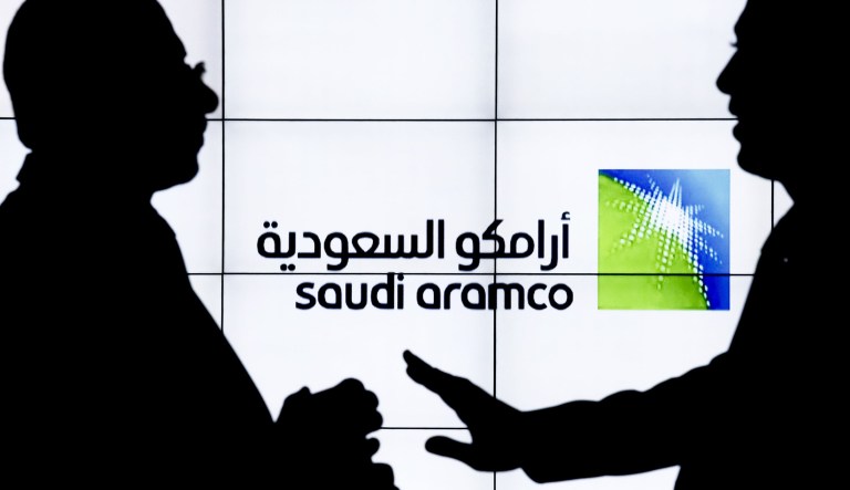 A Saudi Arabian Oil Co. (Aramco) logo sits on an electronic display at the company's corporate pavilion during the 22nd World Petroleum Congress in Istanbul, Turkey, on Wednesday, July 12, 2017. OilÂ fell from the lowest closing price in two weeks as talk of Libya and Nigeria being requested to cap their production failed to dispel doubts about the effectiveness of OPECâs cut.