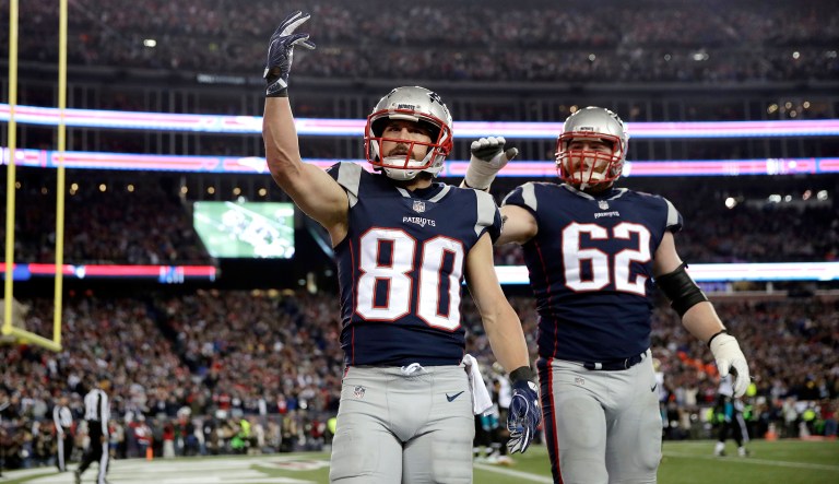 New England Patriots wide receiver Danny Amendola (80) celebrates his touchdown catch beside Joe Thuney (62) during the second half of the AFC championship NFL football game against the Jacksonville Jaguars, Sunday, Jan. 21, 2018, in Foxborough, Mass. The Patriots will face the Philadelphia Eagles in Super Bowl LII. (AP Photo/Charles Krupa)