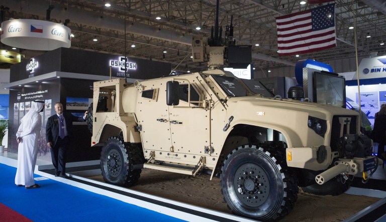 An armored truck sits on display on the Oshkosh Corp. exhibition stand during the 15th Dubai Air Show at Dubai World Central (DWC) in Dubai, United Arab Emirates.