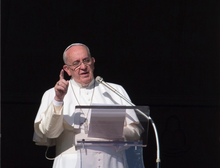 Pope Francis next year will instruct the world's 1.2 billion Catholics to take action on climate change on moral and scientific grounds, according to a report. (AP Photo/Alessandra Tarantino)