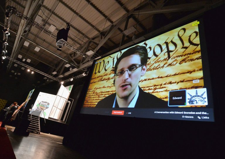 NSA whistleblower Edward Snowden speaks via videoconference during the 2014 SXSW Music, Film + Interactive Festival at the Austin Convention Center on March 10, 2014 in Austin, Texas. (Photo by Michael Buckner/Getty Images for SXSW)