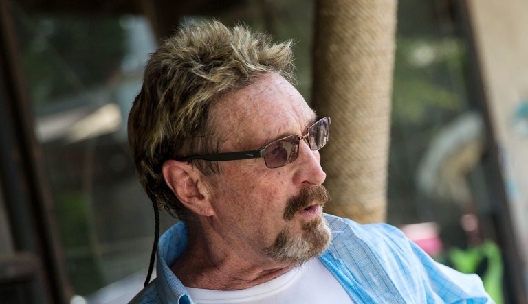John McAfee, founder of McAfee Associates Inc. and chief cybersecurity visionary at MGT Capital Investments Inc., speaks to the media.