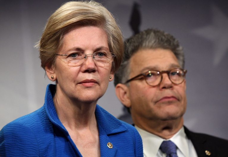 Sen. Elizabeth Warren, D-Mass., and Sen. Al Franken, D-Minn., have co sponsored legislation to further regulate the banking industry in the past. (AP Photo/Lauren Victoria Burke)
