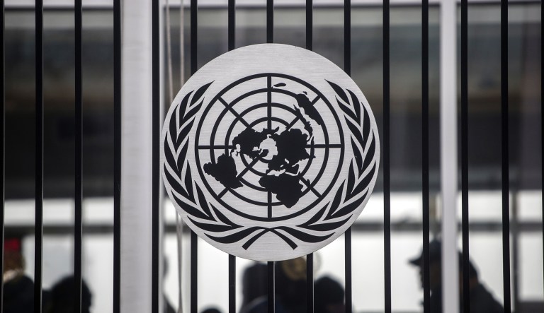 The United Nations logo is displayed outside the organization's headquarters in New York on Friday, April, 27, 2018. 