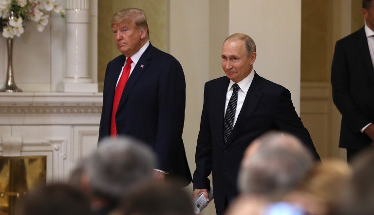 U.S. President Donald Trump, left, and Vladimir Putin, Russia's President, center, arrive for a news conference in Helsinki, Finland, on Monday, July 16, 2018. Trump said a two-hour, one-on-one meeting with Putin was a âgood startâ on Monday for their Helsinki summit, but gave no indication he had relented to increased pressure to confront the Kremlin leader over election meddling.