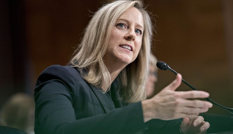Kathy Kraninger, director of the Consumer Financial Protection Bureau (CFPB) nominee for U.S. President Donald Trump, speaks during a Senate Banking Committee confirmation hearing in Washington, D.C., U.S., on Thursday, July 19, 2018. Kraninger, a little-known official who has worked for the White House's Office of Management and Budget (OMB) since March 2017, is poised to succeed her boss Mick Mulvaney as director of the CFPB.