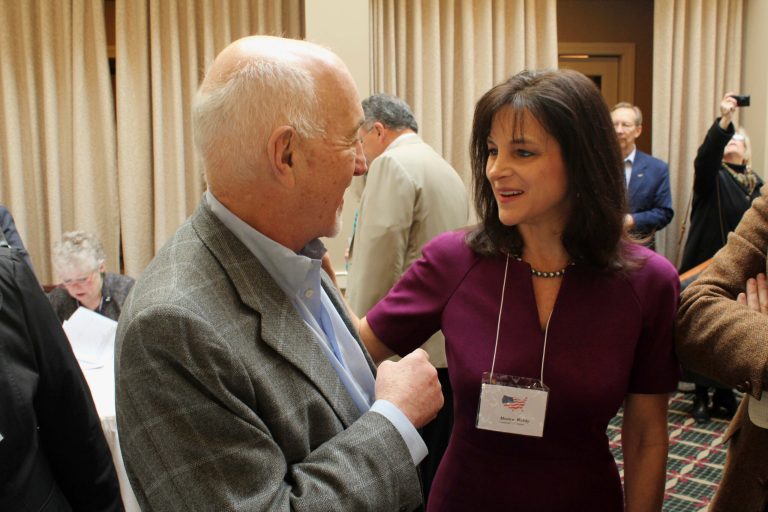 Oregon Republican Senate candidate Monica Wehby, talks to supporter Marvin Hausman in Lake Oswego, Ore., on March 19, 2014. Wehby has come under personal attack fromÃÂ incumbent Democrat Jeff Merkley.ÃÂ (AP Photo/Jonathan J. Cooper)
