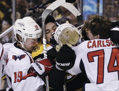 Elise Amendola/AP
Washington Capitals center Nicklas Backstrom, left, will serve a one-game suspension Thursday in Game 4 vs. the Boston Bruins.
