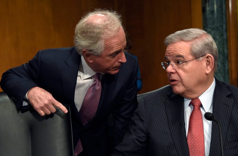 Sen. Robert Menendez, D-N.J., right, and Sen. Bob Corker, R-Tenn. talk on Capitol Hill in Washington. (AP Photo/Susan Walsh)