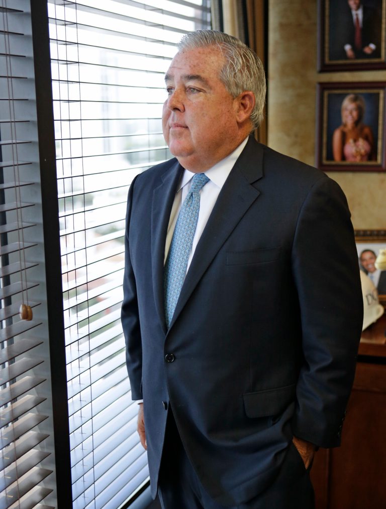 In this Tuesday, Aug. 26, 2014 photo, Attorney John Morgan poses for a photo in his office in Orlando, Fla. Morgan is spending $4 Million out his own pocket to pass a ballot measure that would make medical marijuana legal in Florida. (AP Photo/John Raoux)
