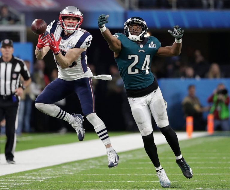 Philadelphia Eagles defensive back Corey Graham (24) breaks up a pass intended for New England Patriots wide receiver Chris Hogan (15), during the second half of the NFL Super Bowl 52 football game Sunday, Feb. 4, 2018, in Minneapolis. (AP Photo/Tony Gutierrez)