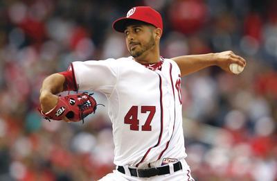 Rob Carr/Getty Images
Left-hander Gio Gonzalez pitched seven scoreless innings against the Reds on Thursday in the Nationals'home debut.