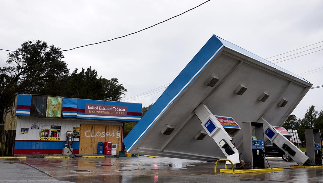 A gas station stands damaged during Tropical Storm Florence near Topsail, N.C.