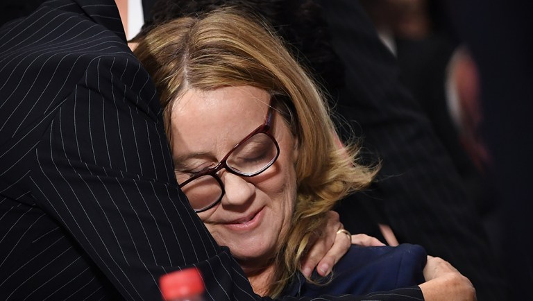 Christine Blasey Ford is embraced by her attorney Debra Katz during a Senate Judiciary Committee hearing in Washington.