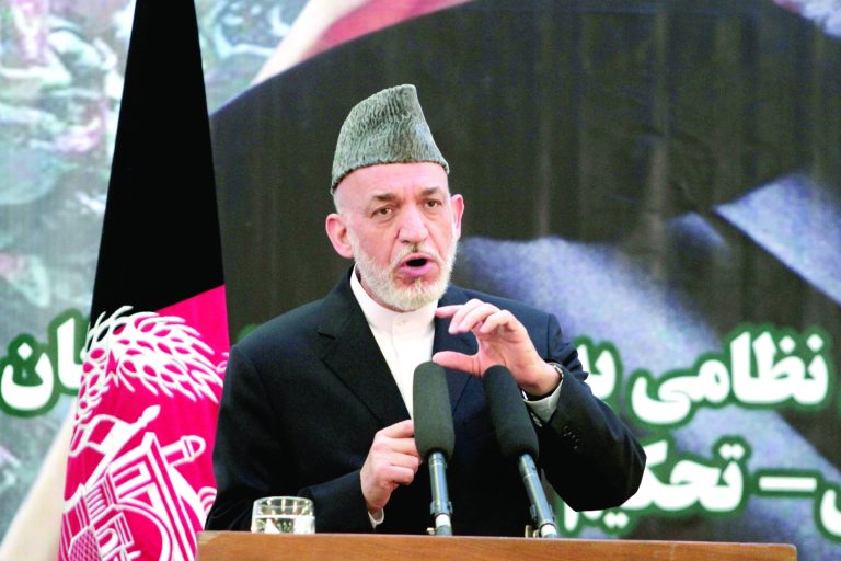 Rahmat Gul/AP
Afghan President Hamid Karzai suspended talks with Washington aimed at setting up a prolonged U.S. presence in the country.