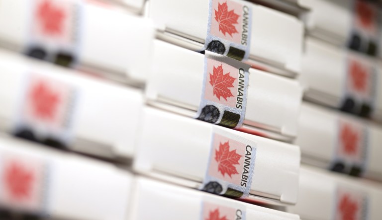 Boxes of pre-rolled joints sit stacked at a Quebec Cannabis Society (SQDC) store during a media preview event in Montreal, Quebec, Canada, on Tuesday, Oct. 16, 2018. The SQDC will have twelve stores open in Montreal, as cannabis becomes legal in Canada on October 17.