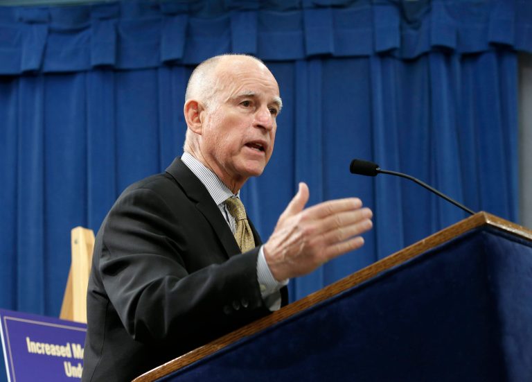 Gov. Jerry Brown responds to a question about his revised 2014-15 state budget that he unveiled at the Capitol news conference in  Sacramento, Calif., Tuesday, May 13, 2014.  Brown's revised spending plan projects  $107.7 billion in general fund spending, which is nearly $1 billion more than the budget Brown proposed in January.(AP Photo)