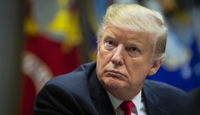 U.S. President Donald Trump listens during a roundtable with Hispanic pastors in the Roosevelt Room of the White House in Washington, D.C., U.S., on Friday, Jan. 25, 2019. TrumpÂ agreed to re-open the federal government for about three weeks without any guarantee Congress would provide money for his proposed border wall, his top campaign promise, capitulating to House SpeakerÂ Nancy Pelosi.