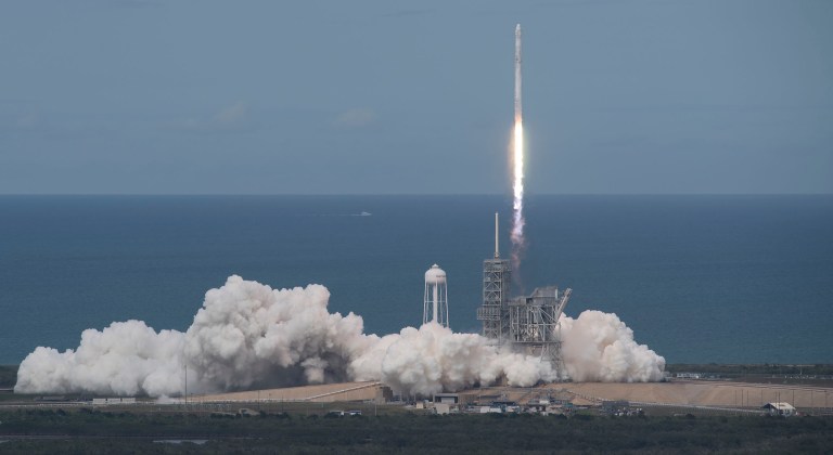 The SpaceX Falcon 9 rocket, with the Dragon spacecraft onboard, launches from pad 39A at NASA's Kennedy Space Center in Cape Canaveral, Fla, Saturday. (Bill Ingalls/NASA via AP)