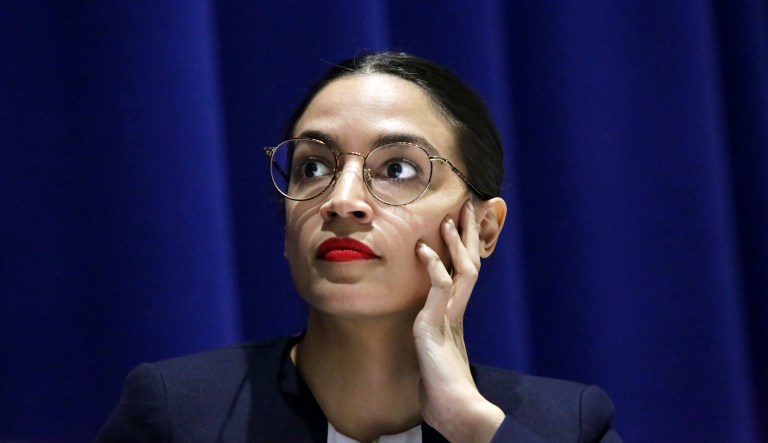 Rep. Alexandria Ocasio-Cortez, D-N.Y., looks on during a town hall event in New York on Wednesday, April 17, 2019.