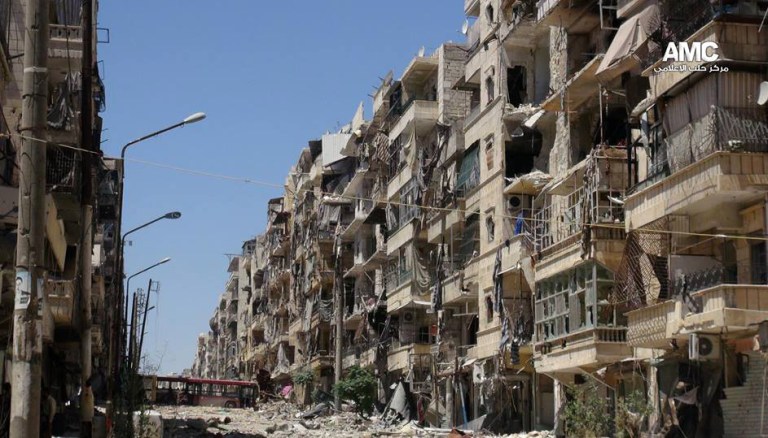 Buildings around Aleppo have been severely damaged during fighting between government forces and Free Syrian army fighters. A top Syrian government official on Sunday dismissed the Obama administration as confused and hesitant, even as Secretary of State John Kerry said Washington has evidence of sarin gas use by Syria and that the case for a military attack is getting 