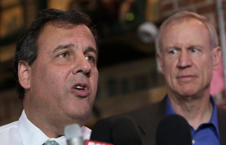 New Jersey Gov. Chris Christie, left, speaks during a visit to a restaurant while campaigning with Illinois Republican candidate for governor Bruce Rauner on Friday, July 25, 2014 in Chicago. (AP Photo/Stacy Thacker)