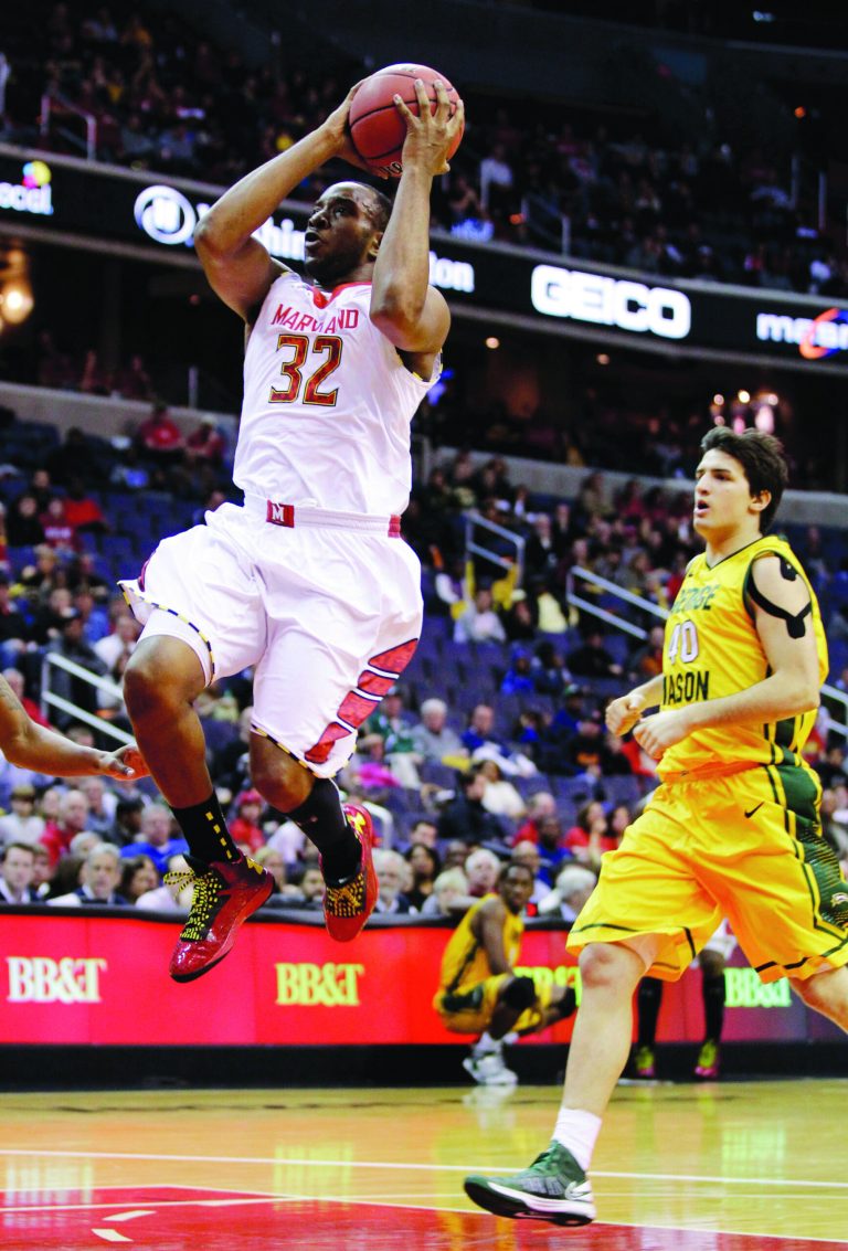 Luis M. Alvarez/AP
Dez Wells finished with 25 points on 11-for-17 shooting and six rebounds as Maryland beat George Mason in the BB&T Classic on Sunday.