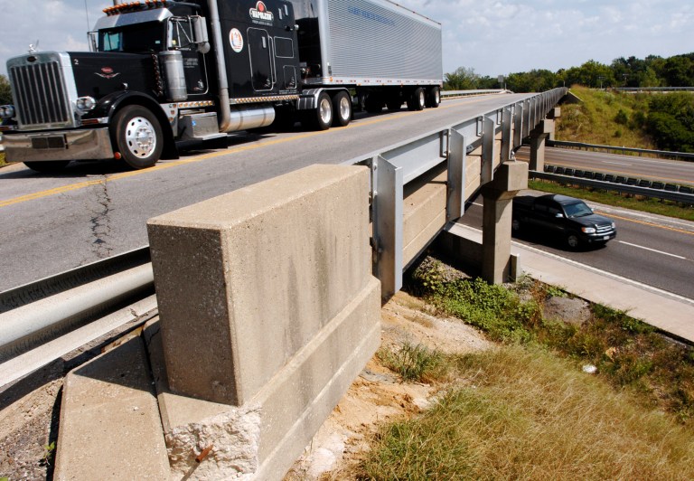 A truck drives on the Highway 40 bridge over I-70 near Midway, Mo., in August 2007. It's possible that the November 2014 ballot in Missouri could contain two major initiatives, including one proposing a 1-cent sales tax hike for transportation. (AP Photo/L.G. Patterson)