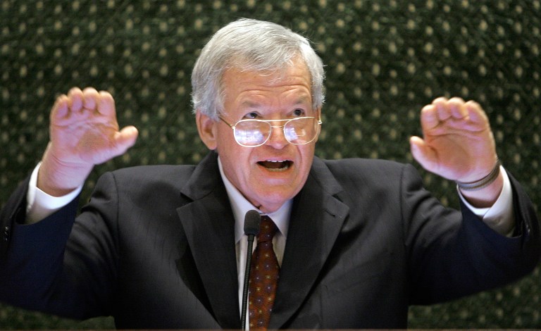 In this March 5, 2008, file photo, former U.S. House Speaker Dennis Hastert speaks to lawmakers on the Illinois House of Representatives floor at the state Capitol in Springfield, Ill. (AP Photo/Seth Perlman, File)