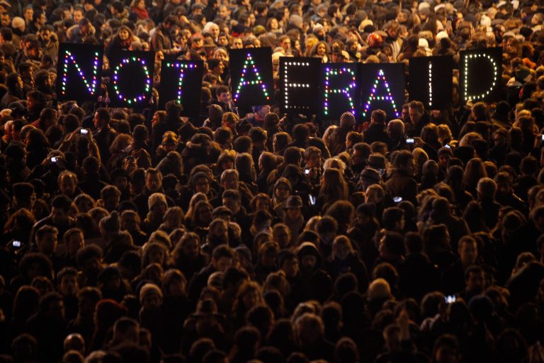 People gather in solidarity of the victims of a terror attack against a satirical newspaper, in Paris, Wednesday, Jan. 7, 2015. (AP Photo/Thibault Camus)