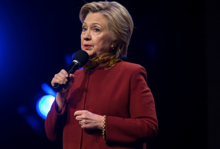 Hillary Clinton hit the Wisconsin Gov. Scott Walker in an ad attacking Bernie Sanders' education plan. (AP Photo/Craig Ruttle)