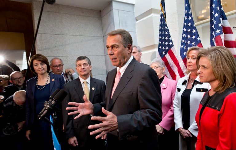 House Speaker John Boehner of Ohio, center, joined by fellow Republicans, speaks during a news conference on Capitol Hill in Washington, Thursday, Oct. 10, 2013, following a closed-door GOP meeting. (AP/J. Scott Applewhite)