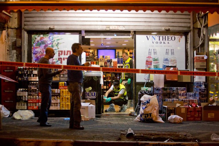 The man was killed when a Palestinian stabbed seven people, police spokeswoman Luba Samri said Tuesday. (AP Photo/Sebastian Scheiner)
