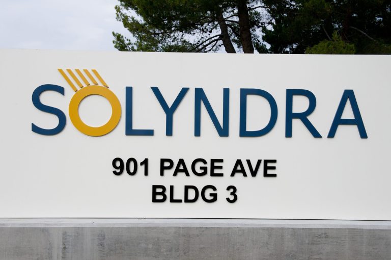 Solyndra Inc. signage is displayed outside of the company's headquarters in Fremont, California, U.S., on Monday, Dec. 12, 2011. Solyndra Inc., the bankrupt solar company, is auctioning off more surplus assets as part of its bankruptcy proceedings on Dec. 13. Photographer: David Paul Morris/Bloomberg