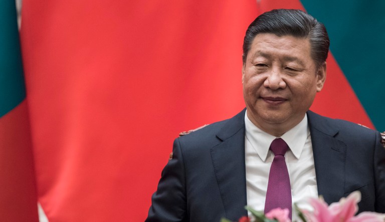 According to a report, China will overtake the United States economy in 2032. (Fred Dufour/Pool Photo via AP)