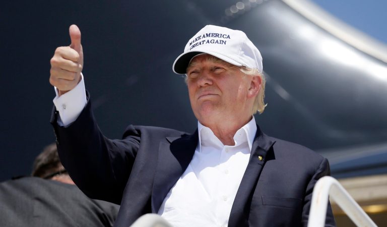 Republican presidential hopeful Donald Trump gives a thumbs up before boarding his campaign plane to depart from Laredo, Texas, Thursday, July 23, 2015. (AP Photo/LM Otero)